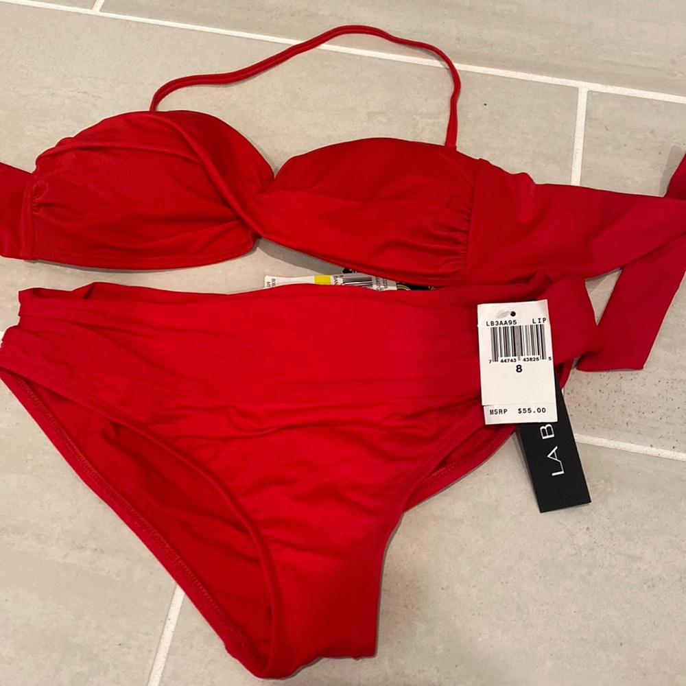 Red bikini mid rise size 8 fits like a small / medium never worn tags on